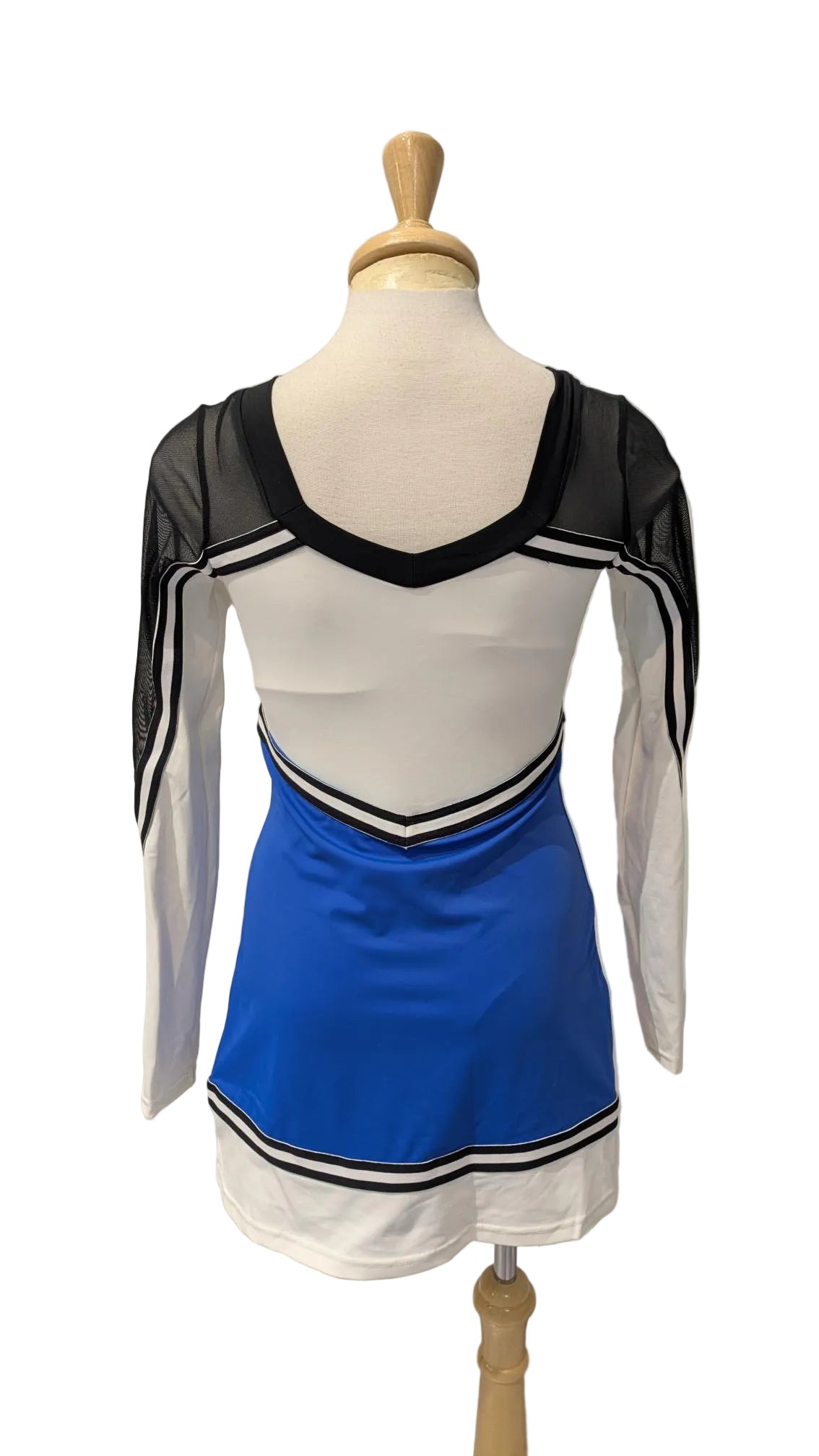 A cheerleader-style costume dress displayed on a mannequin torso against a white paneled wall. The costume has a white body, a bright blue skirt section, black mesh sleeves, and black-and-white striped trim.