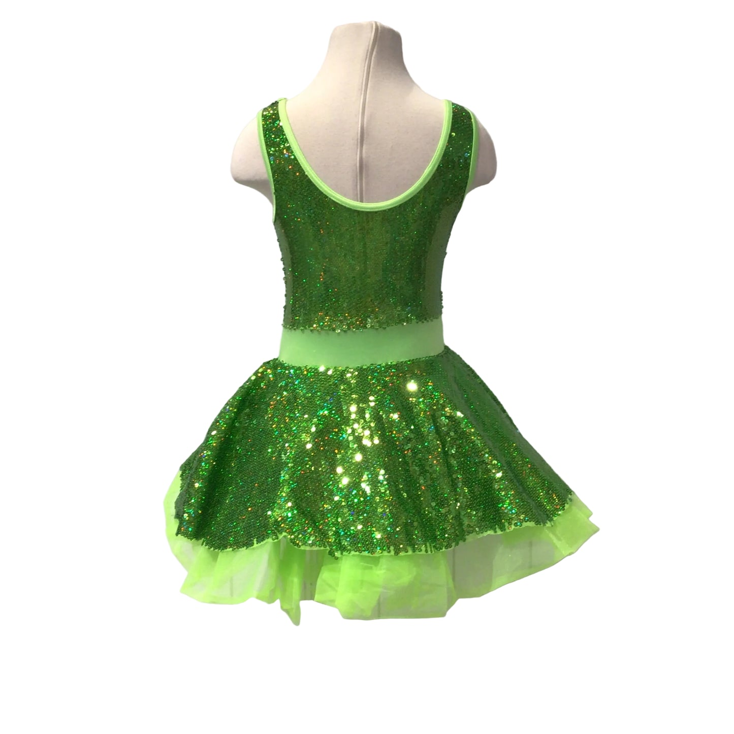 A green sequined dance or gymnastics leotard dress displayed on a white mannequin torso against a white paneled background.