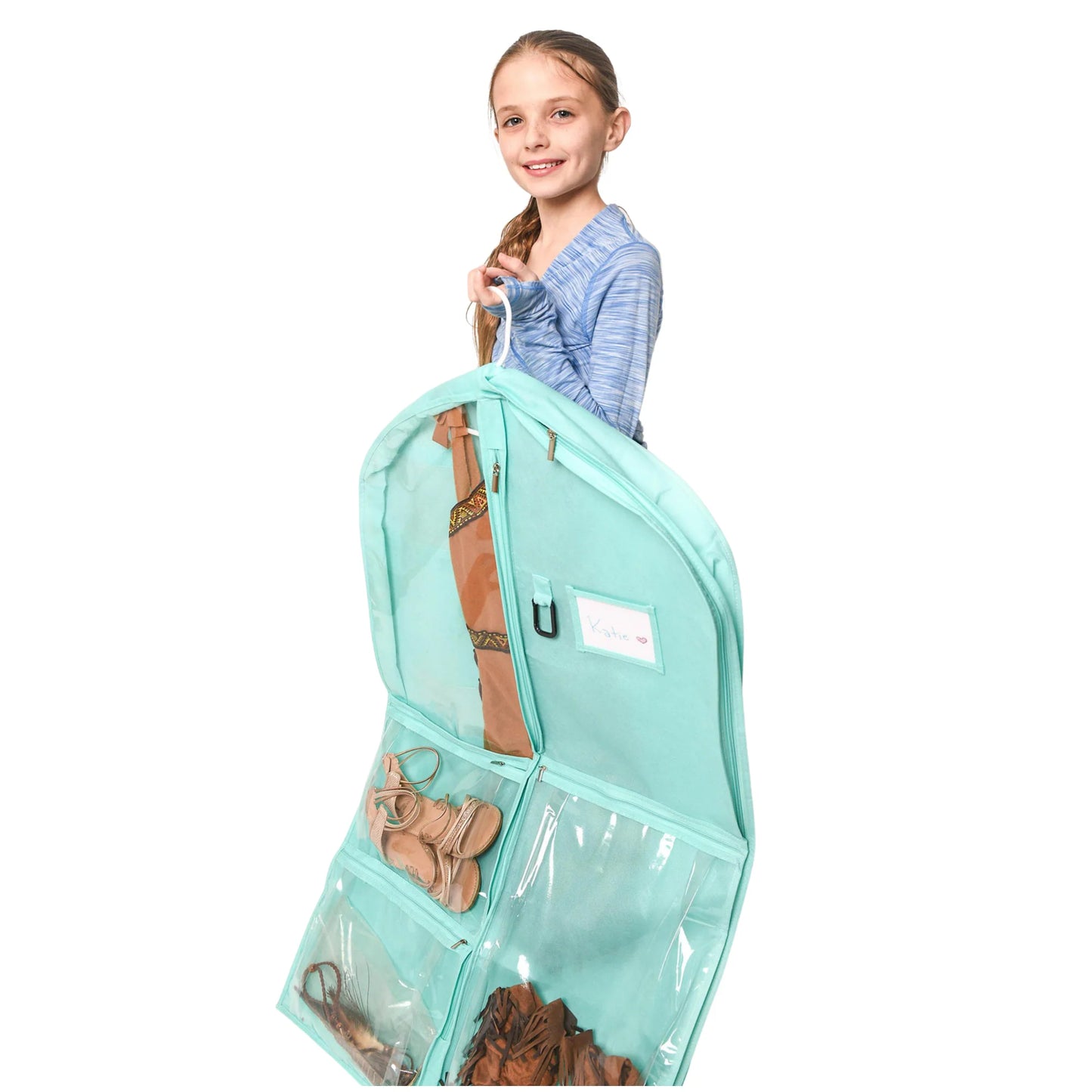 Dancer holding seafoam green coloured garment bag with clear pockets