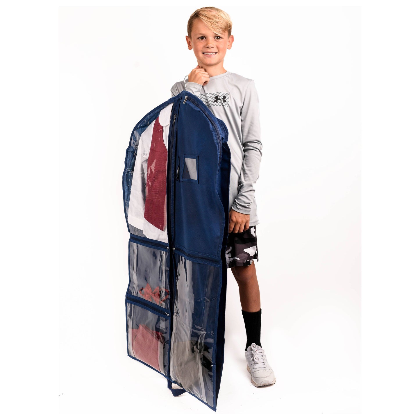 Dancer holding navy coloured garment bag with clear pockets