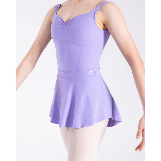 Girl is wearing a purple leotard and the Sylvie Skirt by Claudia Dean