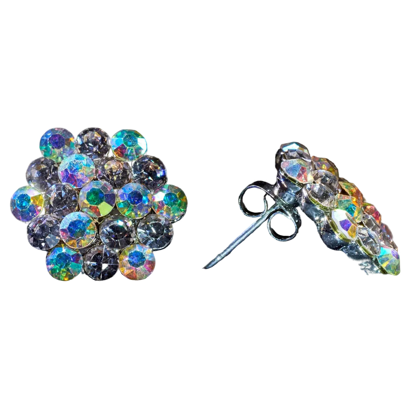 A pair of silver stud earrings with round iridescent rhinestones, one shown from the front and the other from the side/back on a dark textured background.