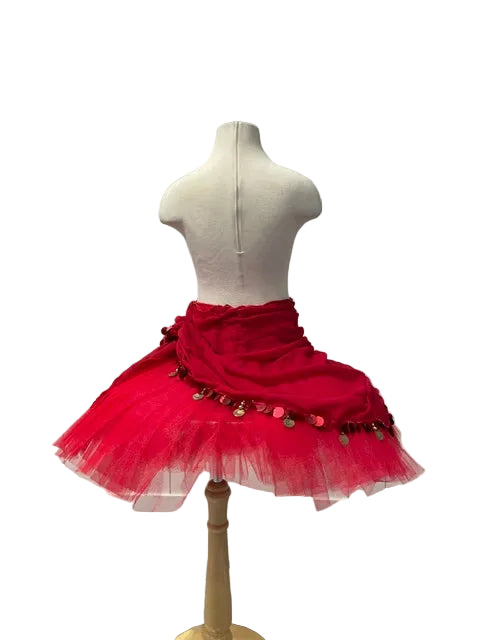 A bright red belly dance skirt with a gathered waist, layered tulle tutu, and hanging coin embellishments, displayed on a cream mannequin torso.