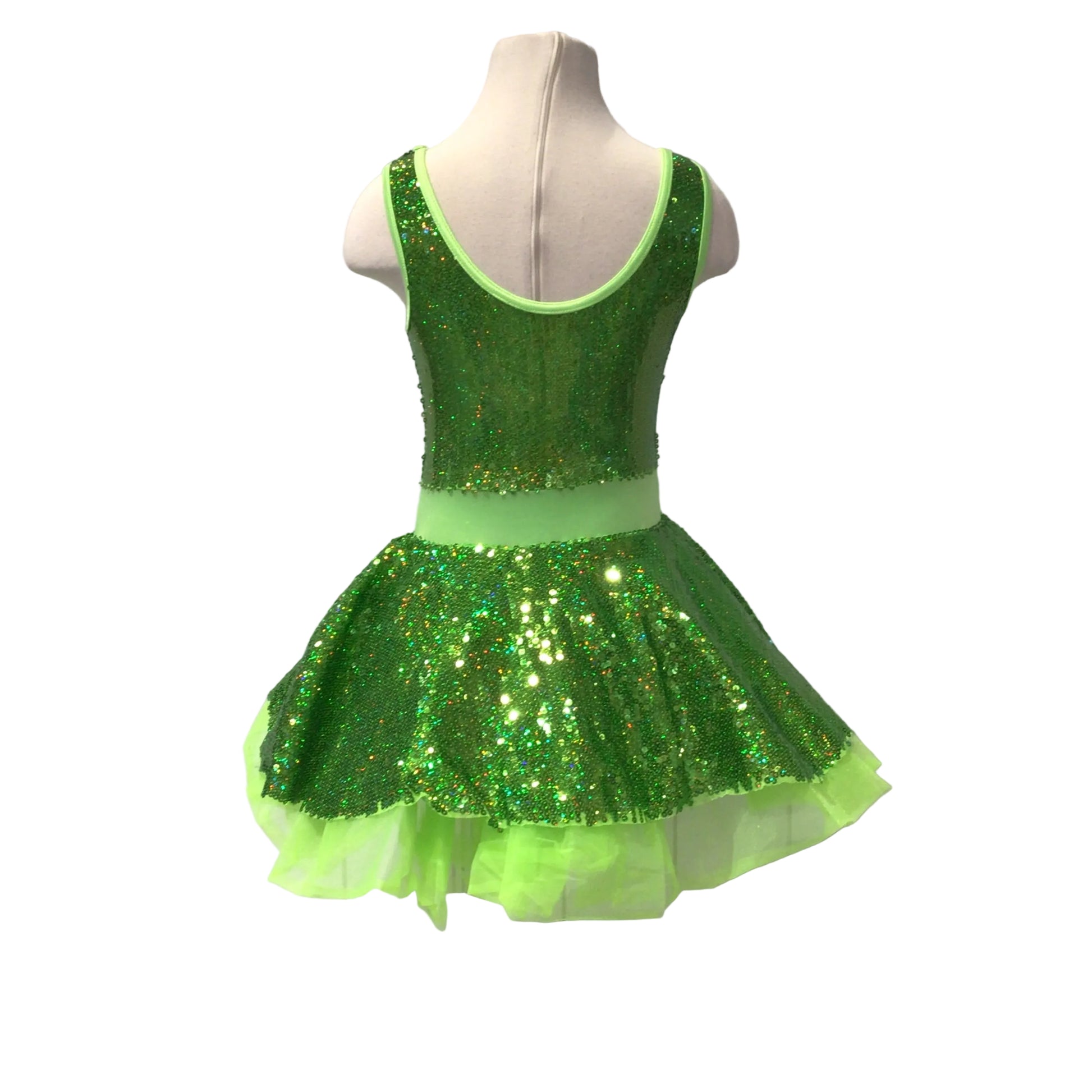 A green sequined dance or gymnastics leotard dress displayed on a white mannequin torso against a white paneled background.