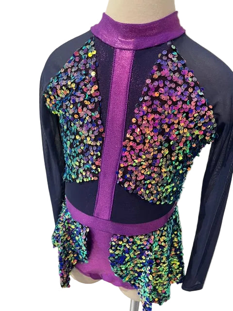 A long-sleeve dance or gymnastics leotard displayed on a mannequin torso, featuring a purple high-neck collar and center panel, dark navy sleeves and waist trim, and iridescent multicolor sequins across the upper back and hips.