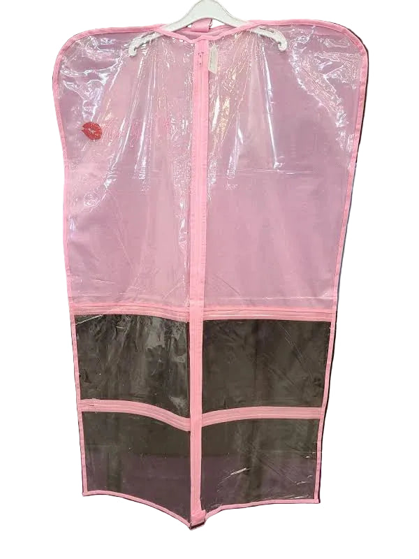 A pink zippered garment storage bag with clear plastic panels, hanging on a white hanger against a background of storage bins.